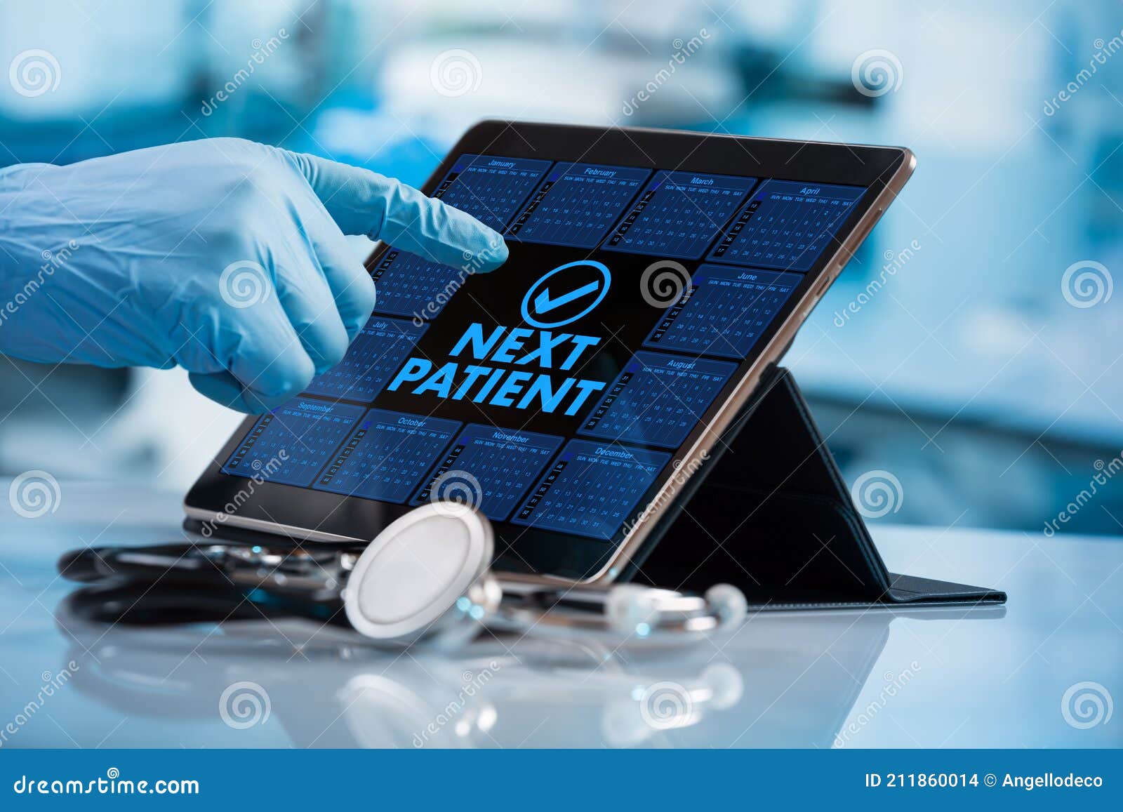 physician working in medical schedule with tablet with the message Ã¢â¬Ånew patientÃ¢â¬Â in the screen for new videoconference